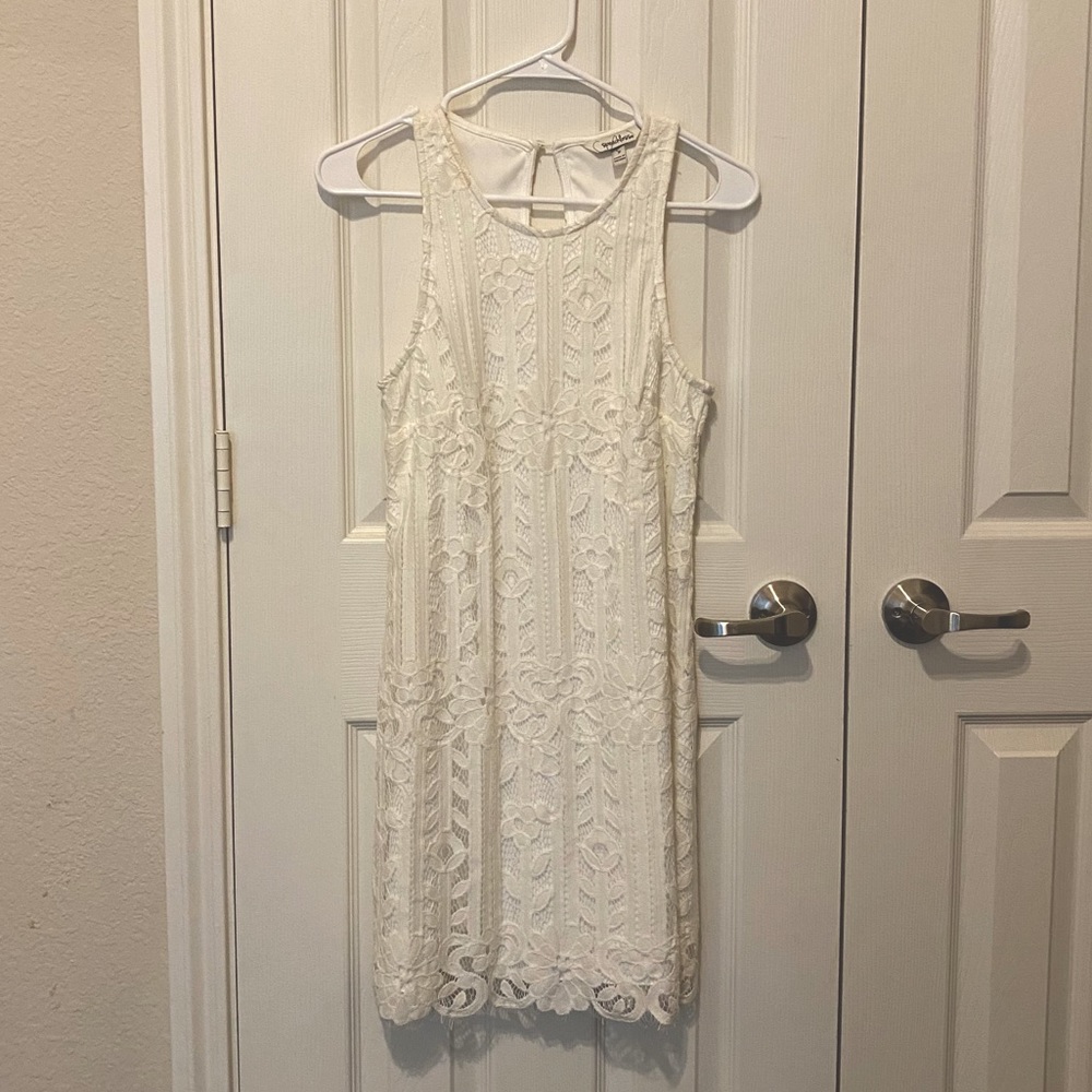 White sleeveless floral dress